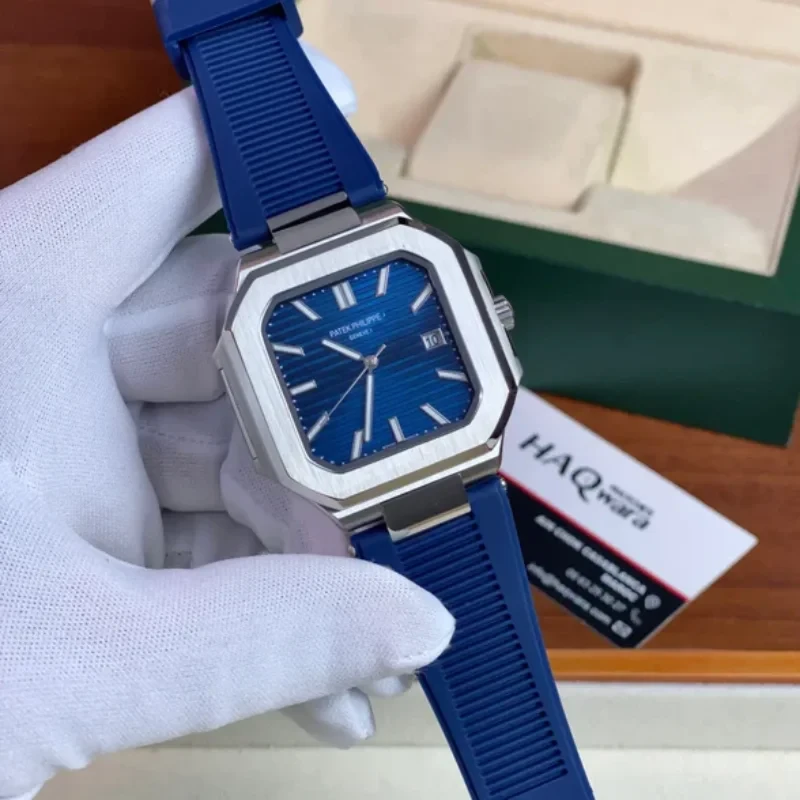 Patek-Philippe-Cubitus-Silver-Blue-Silicone-on-hand.webp